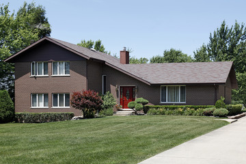 Brick home with red door