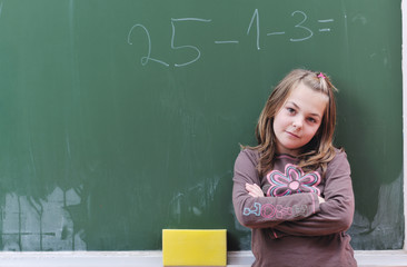 happy school girl on math classes