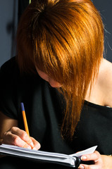 Student woman writing