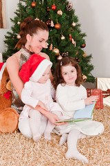 Mother with her daughters at Christmas
