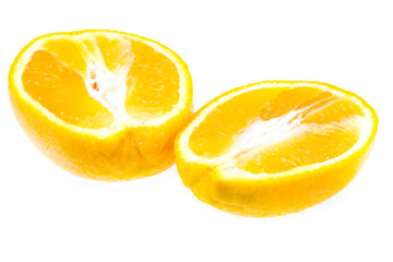 Cut into two parts fresh isolated orange on a white background