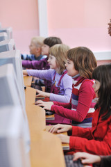 Fototapeta na wymiar it education with children in school