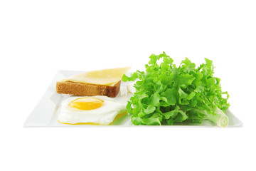green lettuce and fried eggs