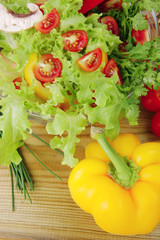 fresh salad on wood
