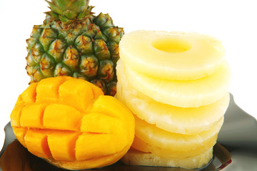 raw fruits on black plate