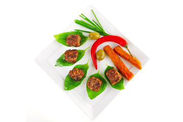 small french beef cutlets on basil