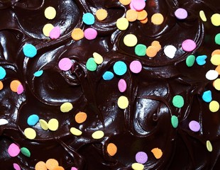 Chocolate frosting with confetti sprinkles