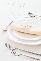 closeup of white place setting