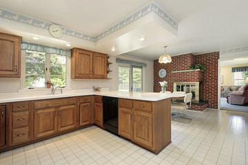 Kitchen with brick fireplace