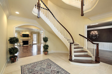 Foyer with curved staircase