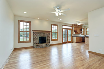 Family room with brick fireplace