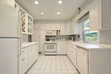 Kitchen with white cabinetry