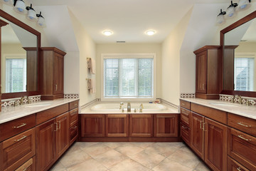 Master bath with wood cabinetry
