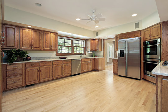 Large kitchen with wood cabinetry