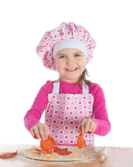 Little girl cooking pizza