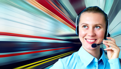 Businesswomen and train on speed in railway station