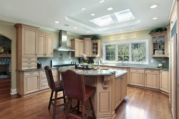 Luxury kitchen with oak wood cabinetry
