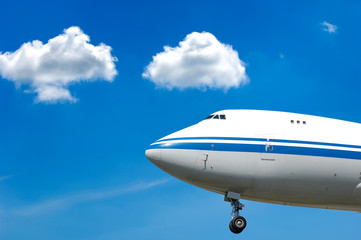 Jumbo plane and clouds