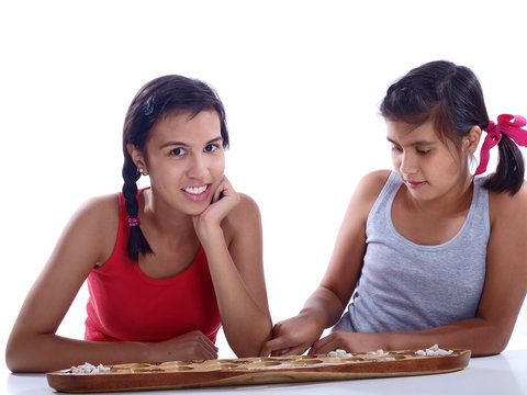 girls playing mancala