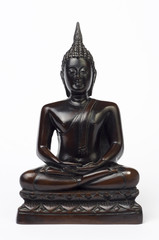 Dark brown wooden carved Buddha figure isolated on white.