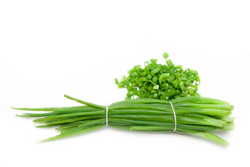 Obraz premium Cut green onion isolated on the white background