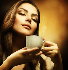 Beautiful Woman with cup of Coffee