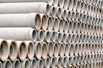 Stacked concrete pipes abstract