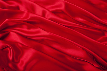 Fototapeta na wymiar Smooth elegant red silk can use as background
