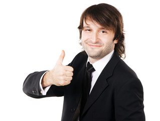 Handsome businessman showing thumbs up