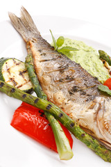 grilled fish with vegetables and sauce
