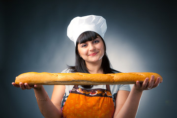 woman cook holding fresh bread