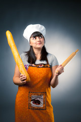 woman cook with bread and rolling-pin