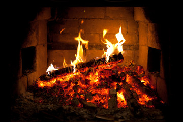 burning fire in the fireplace
