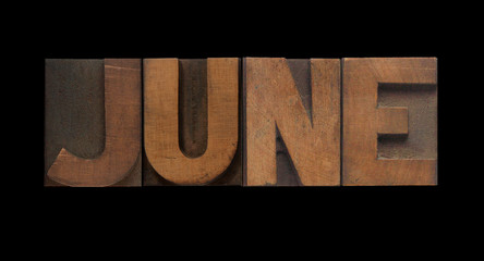 the word June in old letterpress wood type