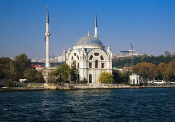 Fototapeta na wymiar Dolmabahce mosque at the coast of Bosphorus in Istanbul, Turkey