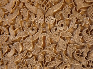 Detail of wall carvings at the Alhambra in Granada, Spain