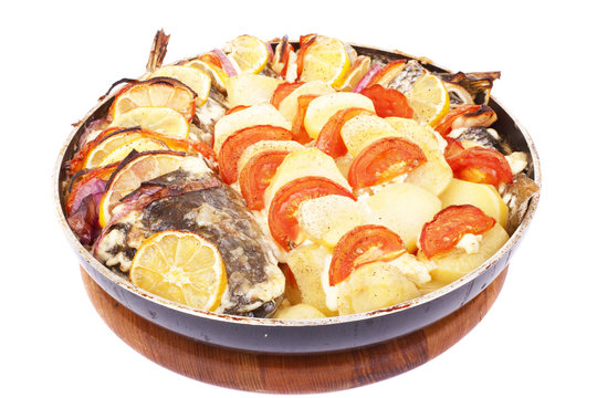 Haarder stuffed baked with potatoes and tomatoes