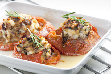 baked tomatoes with chicken meat and mushrooms