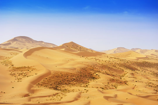 desert dune silhouette background © xiaoliangge