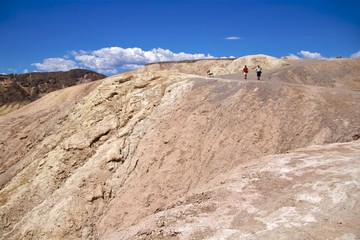 Tourists hiking on Zabriskie Point trail, Death Valley NP