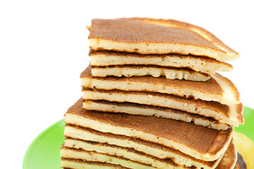 Pancakes on a plate isolated on white