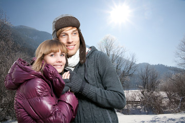 Obraz premium couple outdoors in winter