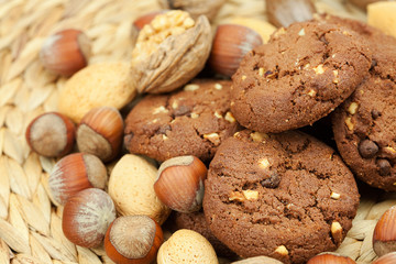 oatmeal cookies and nuts in a wicker mat