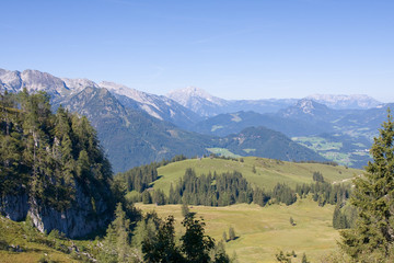 a view from the top of the alpine peak in the summertime