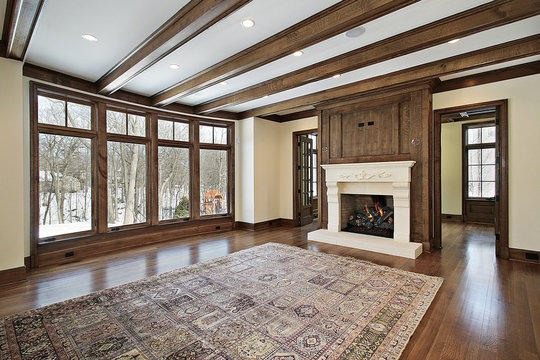 Family room with wood ceiling beams