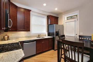 Kitchen with cherry wood cabinetry