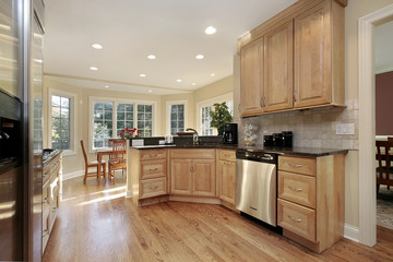 Kitchen with oak cabinetry
