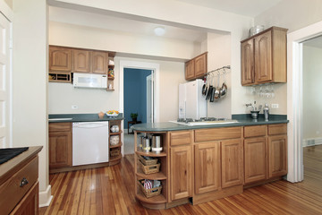 Kitchen with oak wood cabinetry