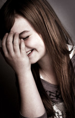 Fototapeta premium Beautiful young girl laughing