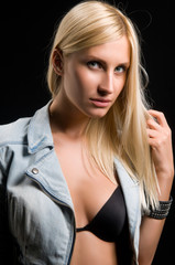 Naklejka premium young woman on a black background